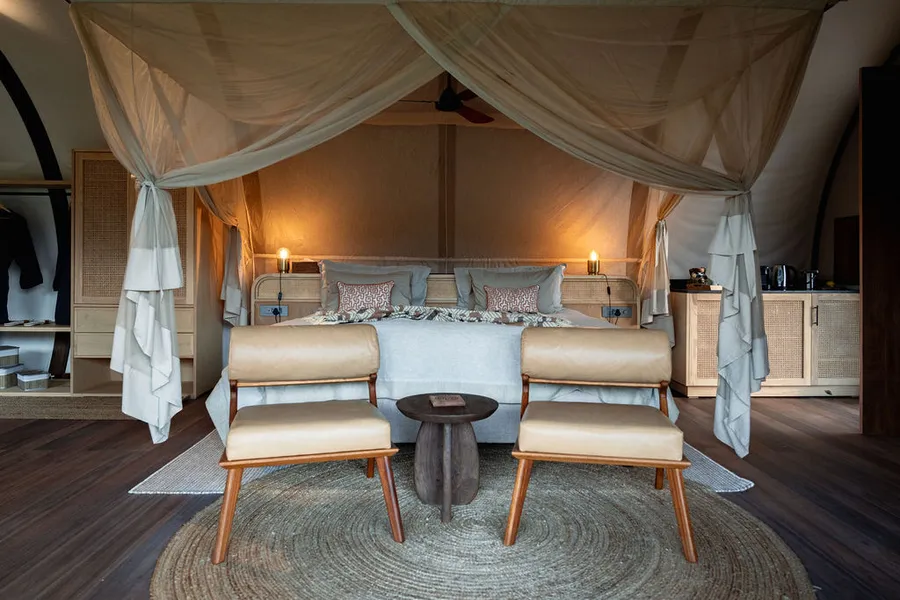 King bed and seating inside a lodge suite